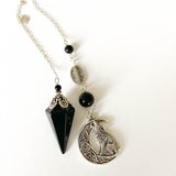 Shungite Pendulum with Howling Wolf on Celtic Moon