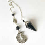 Shungite Pendulum with Howling Wolf on Celtic Moon