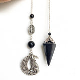 Shungite Pendulum with Howling Wolf on Celtic Moon