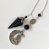 Shungite Pendulum with Howling Wolf on Celtic Moon